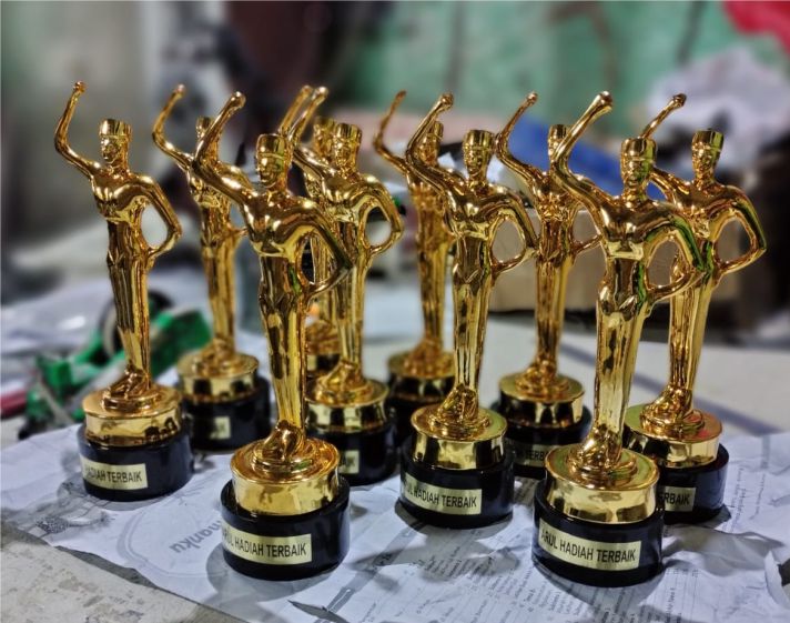 bikin plakat timah about us